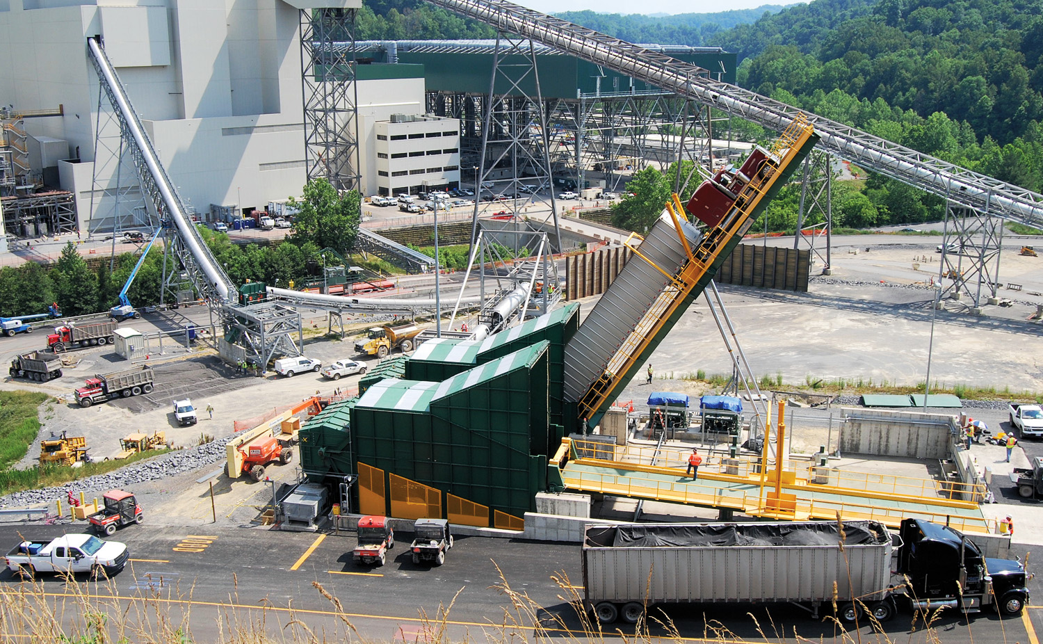 A wood tipper delivers wood waste to the Virginia City circulating fluidized bed plant, which can burn up to 20 percent biomass along with coal.